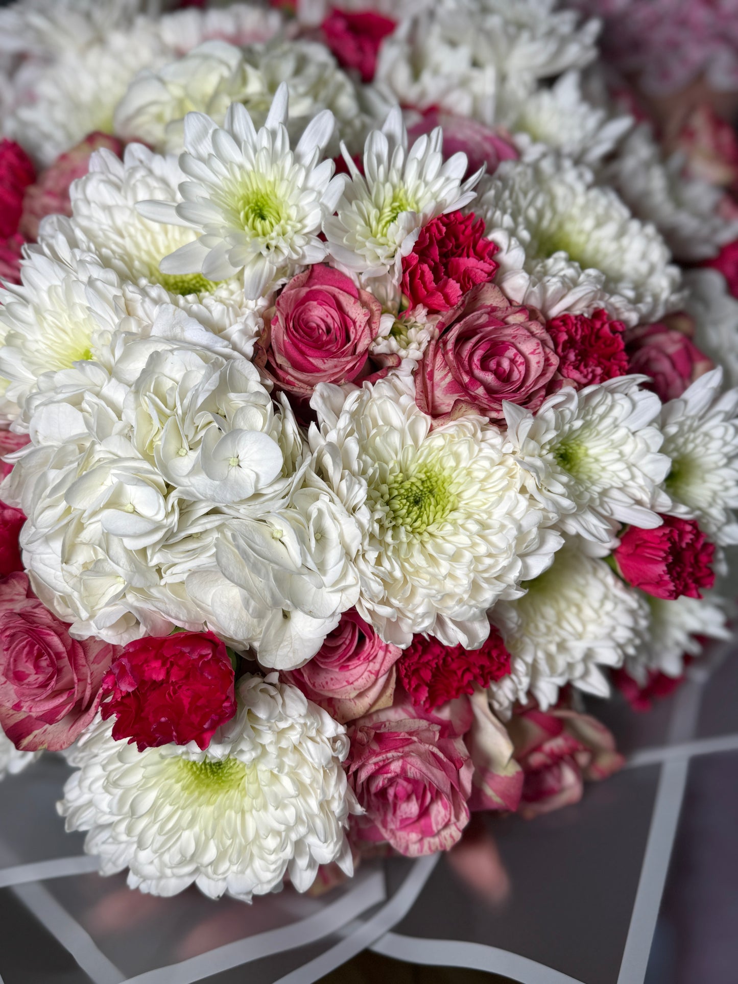 A bouquet of roses, hydrangeas, chrysanthemums and carnations