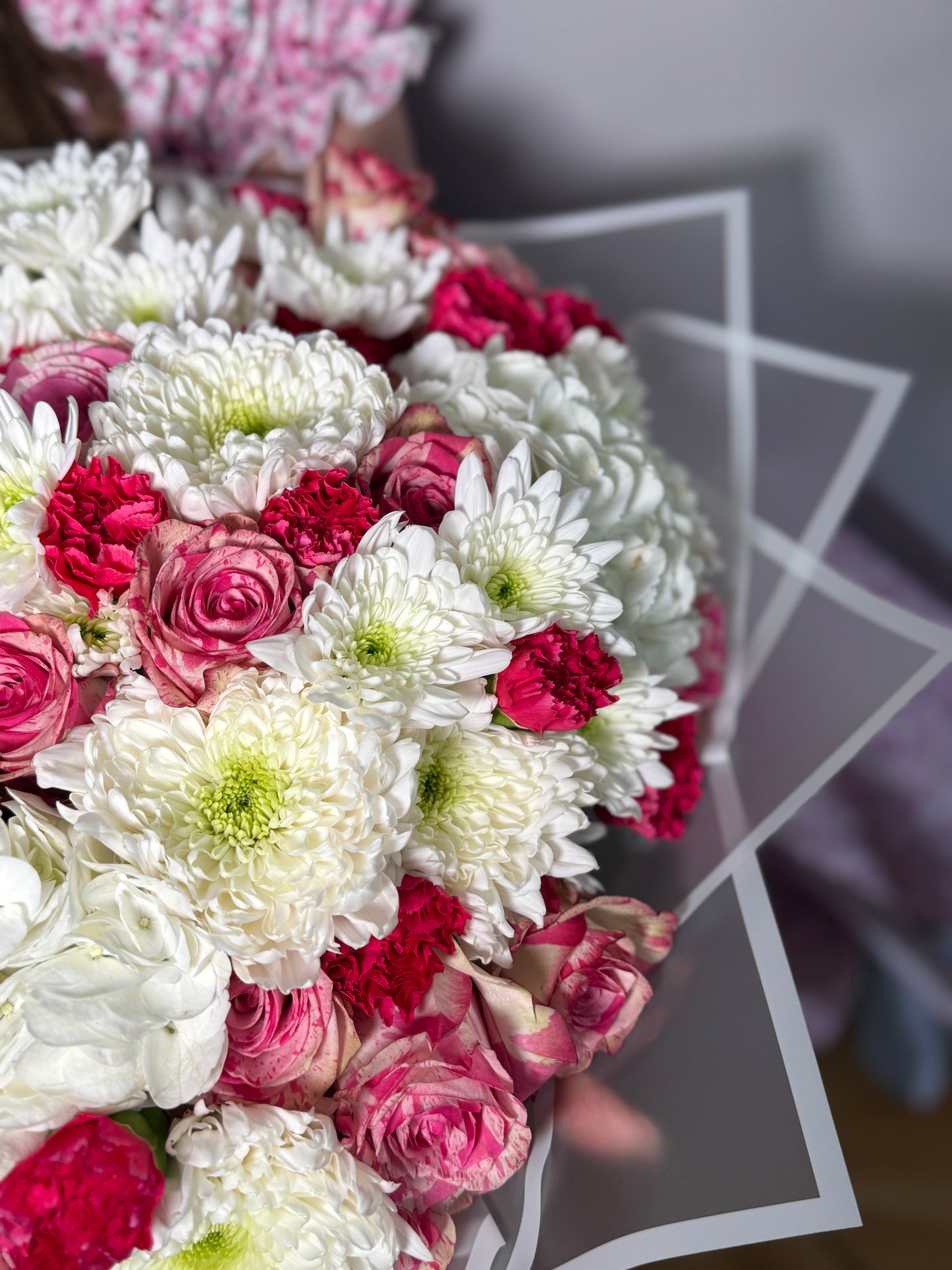 A bouquet of roses, hydrangeas, chrysanthemums and carnations