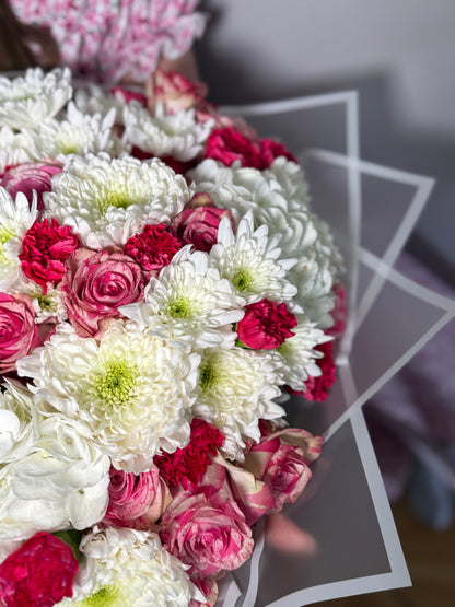 A bouquet of roses, hydrangeas, chrysanthemums and carnations