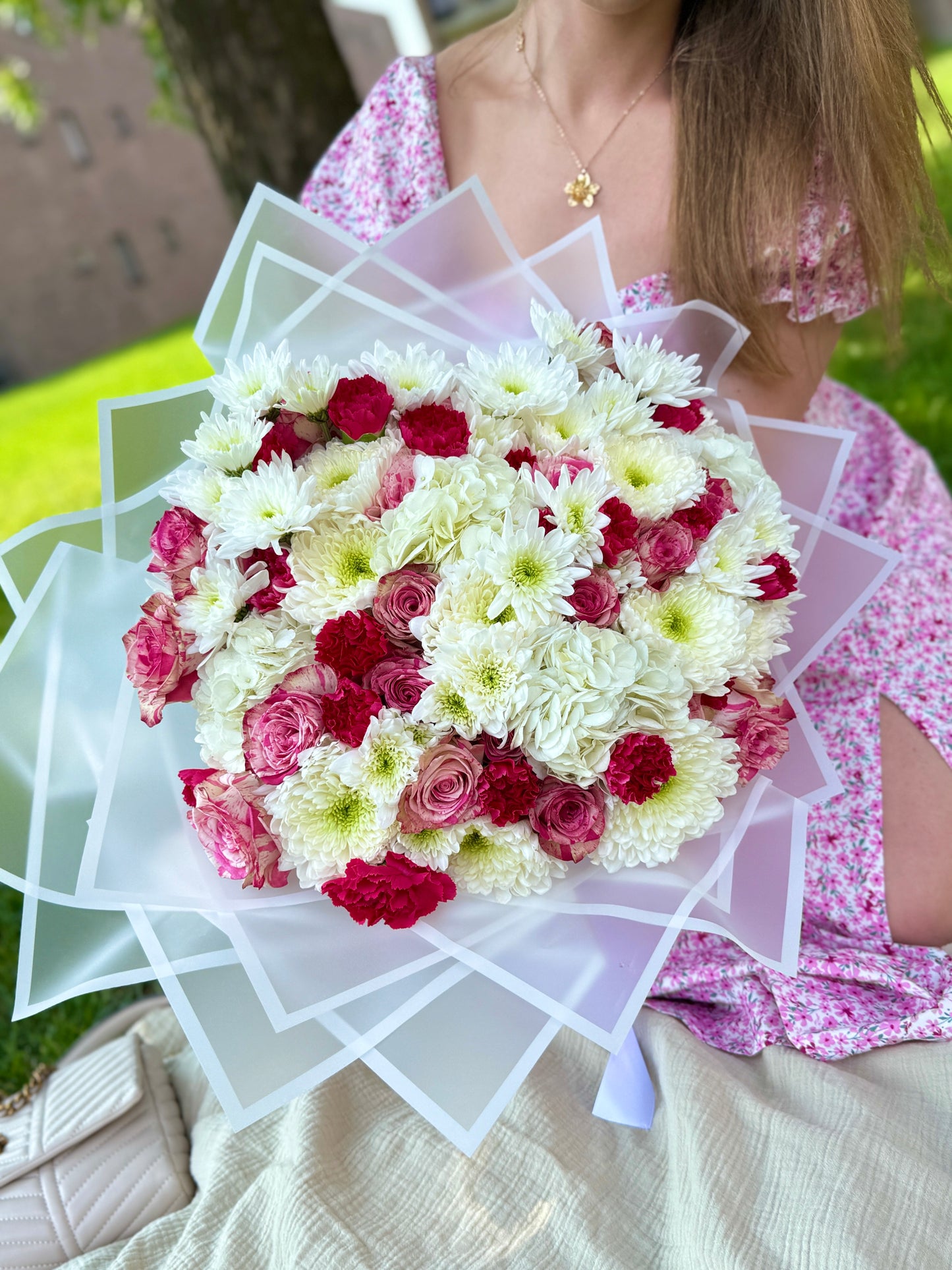 A bouquet of roses, hydrangeas, chrysanthemums and carnations